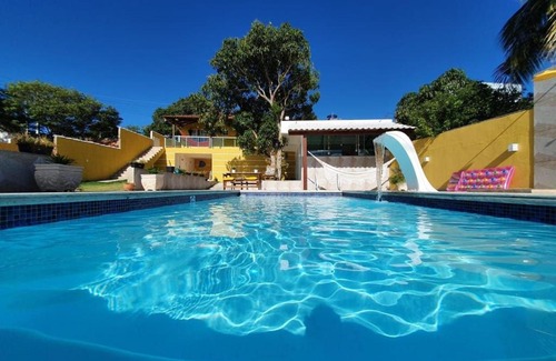 Cabo Frio Casa | Casa Amarela - Linda casa familiar com piscina na Reserva do Peró em Cabo Frio