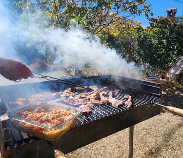 Prades Casa | Casa amb jardí i llar de foc