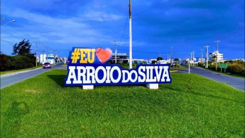 Balneario Arroio do Silva Casa | Casa bege Bal Arroio do Silva com internet