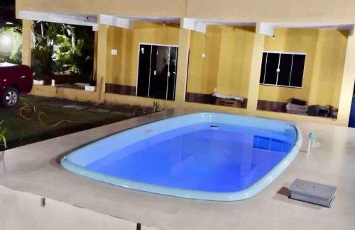 Ariro Casa | Casa com churrasqueira e piscina, perto de riacho