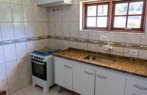 Vila Britania Casa | Casa com grande quintal em Campos do Jordão