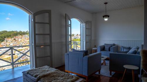 Vila Albertina Casa | Casa com lareira, Wi-Fi e varanda com vista