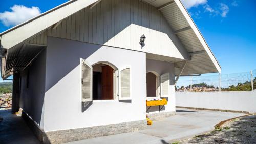 Vila Albertina Casa | Casa com lareira, Wi-Fi e varanda com vista