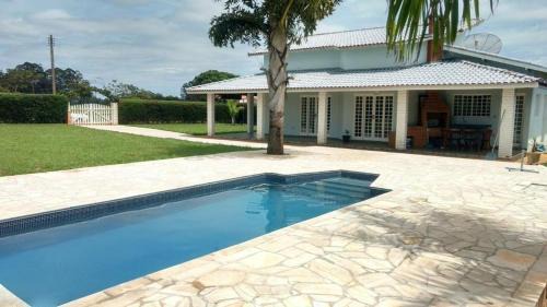 Aguas de Santa Barbara Casa | Casa com piscina em condomínio ensolarada!