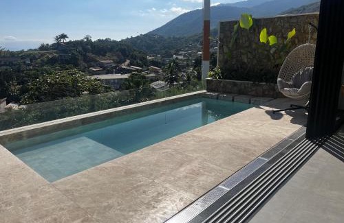 Itaguassu Casa | Casa com piscina aquecida, jacuzzi e 60 m da praia