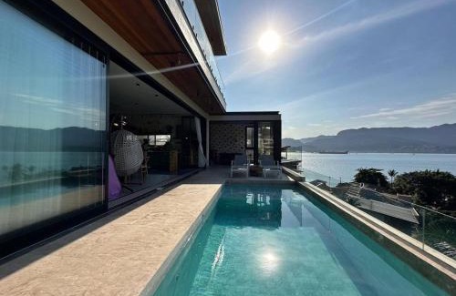 Itaguassu Casa | Casa com piscina aquecida, jacuzzi e 60 m da praia