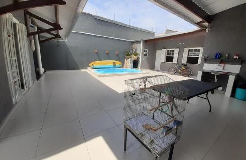 Praia dos Sonhos Casa | Casa com piscina, confortável e ótima localização