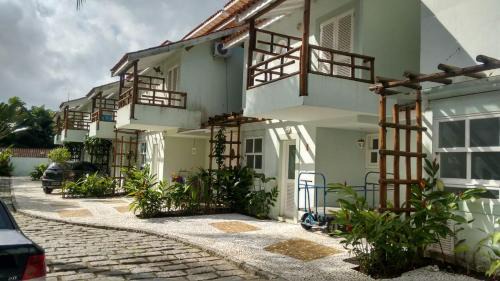 Camburi Casa | Casa com piscina e churrasq na Praia de Camburí