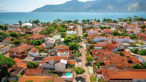 Praia do Pontal da Cruz Casa | Casa com piscina em São Sebastião próxima a praia e espaços de casamentos