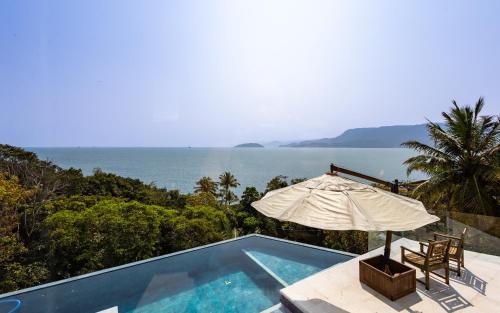 Praia de Itapecerica Casa | Casa com piscina em condomínio e lazer à beira-mar