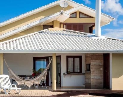 Santinho Casa | Casa com piscina frente ao mar Praia do Santinho