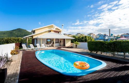 Santinho Casa | Casa com piscina frente ao mar Praia do Santinho
