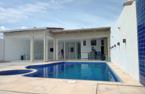 Aracati Casa | Casa com Piscina, hidromassagem e churrasqueira.