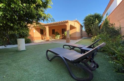 El Palmar Chalet De Esquí | Casa con jardín privado y piscina compartida