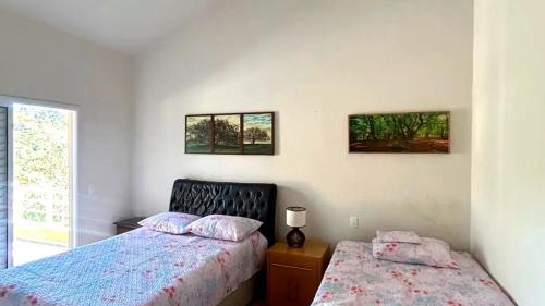 Jacarei Casa | Casa confortável com piscina e rio em Jacareí