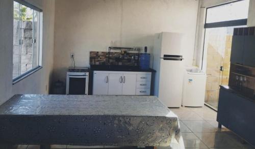 Caravelas Casa | Casa da Cris em Praia do Grauçá com Wi-Fi, ar condicionado e garagem