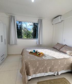 Piratuba Casa | Casa das Bromélias- 2 Quartos climatizados -Casa com Quiosque em meio à natureza!