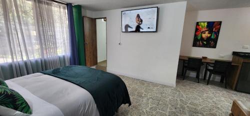 Laureles - Estadio Apartamento | Casa de las palmas 3