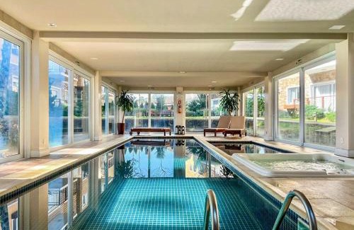 Carniel Apartamento | Casa de Pedra 2 Suítes e Piscina by Achei Gramado