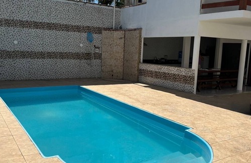 Porto Seguro Casa | Agradable casa de playa con piscina, aire acondicionado. WiFi, Balcón con vistas al mar