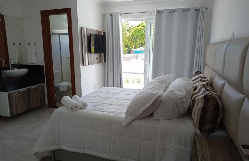Puerto Seguro Center Casa | Casa em Arraial D'ajuda -3 suítes, lazer completo- Piscina, Sauna e Beach tênis