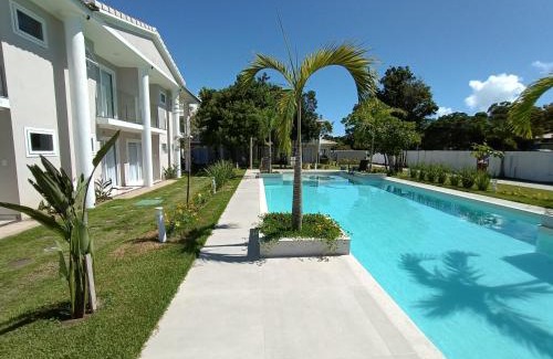 Puerto Seguro Center Casa | Casa em Arraial D'ajuda -3 suítes, lazer completo- Piscina, Sauna e Beach tênis