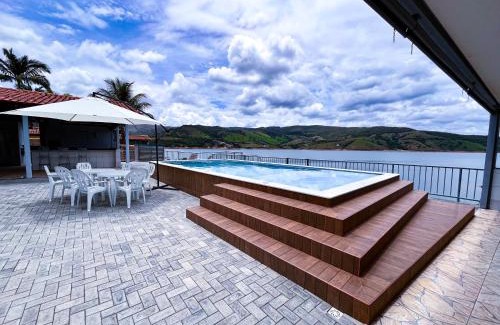 Capitolio Casa | Casa em Capitólio com piscina e vista para lago | W1