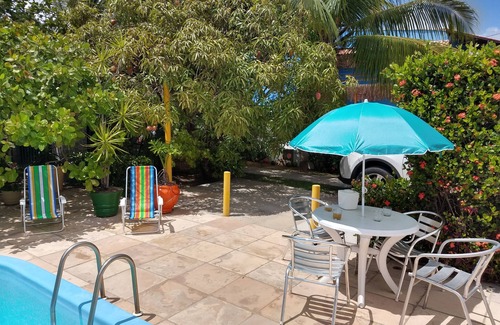 Centro Casa | Casa em Porto de Galinhas. 450m aproximado da praia. Piscina com apoio coberto