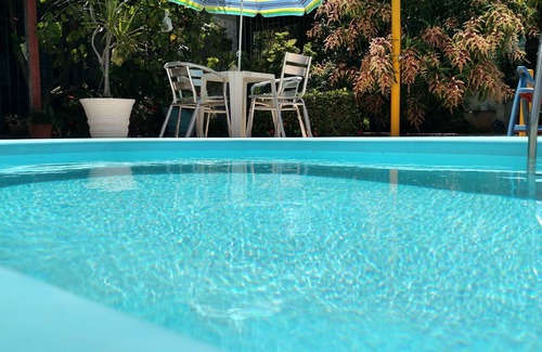 Centro Casa | Casa em Porto de Galinhas. 450m aproximado da praia. Piscina com apoio coberto