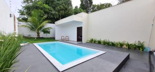 Porto Seguro Casa | Casa em Taperapuan com 3 Suítes e Hidromassagem