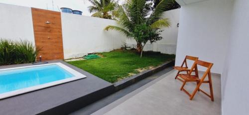 Porto Seguro Casa | Casa em Taperapuan com 3 Suítes e Hidromassagem