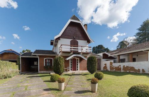 Jardim Andira Casa | Casa espaçosa c/lareira em Campos do Jordão RAS175
