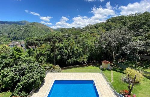 Itaipava Casa | Casa Feliz: serviço, hidro aquecida, piscina