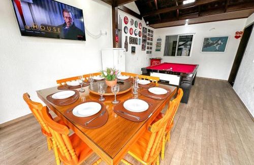 Ze Amandio Casa | CASA GOLFINHO 348 - casa aconchegante com piscina, churrasqueira, mesa de sinuca e jogos