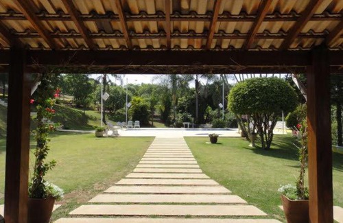 Jardim Primavera Casa | Casa Guacuri - Casa de temporada e eventos - apartamentos com suítes - Piscinas e Amplo Estacionamento