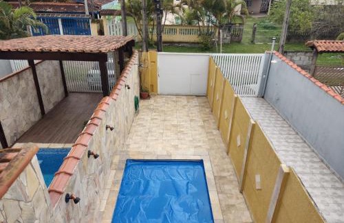 Tupy Casa | Casa inteira ITANHAÉM Piscina AQUECIDA, Churrasqueira e Wi-fi