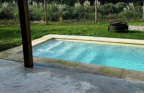 Punta Colorada Casa | Moderna con Piscina climatizada y fogón exterior en Punta Colorada.