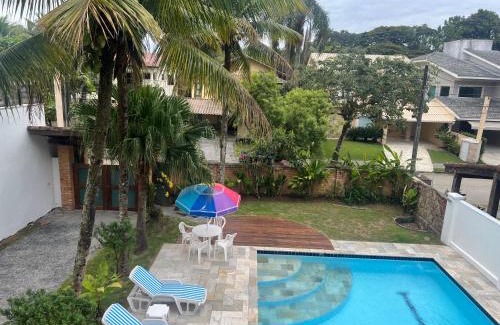 Riviera de Sao Lourenco Casa | Casa na Praia Riviera de São Lourenço 4 Suítes para até 12 pessoas 4min a pé da Praia e 11 min a pé do Shopping