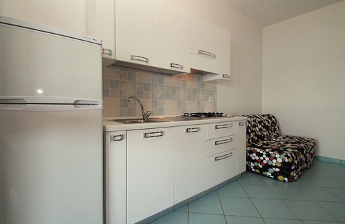Montecorice Casa | Casa Panna A: Un apartamento alegre que es parte de una villa ubicada directamente en la playa.