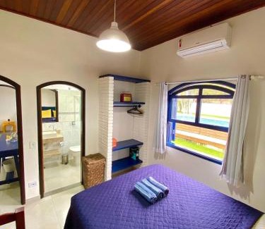 Caraguatatuba Apartamento | CASA PARATY · linda piscina, bilhar, campo de futebol, em condomínio