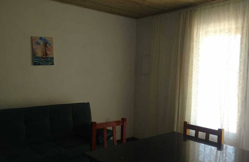 Jaguaruna Casa | Casa Pedra Ferrugem Balcony with hammock and sea view - 180m from the beach
