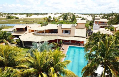 Estancia Casa | Casa Sensacional com Piscina na Praia das Dunas