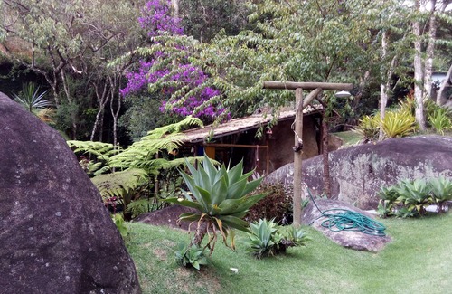Araras Casa | Casa Tico tico das Araras surrounded by mountains in a forest reserve.