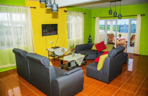 Beau Champ Casa | Case Latanier