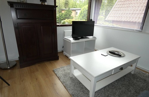 Marum Chalet De Esquí | Centraal gelegen op de grens van Friesland,Groningen,Drenthe direct tegen bos.