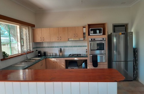 Beachlands Casa | Central, 2 minute drive to beaches, town and hospital.