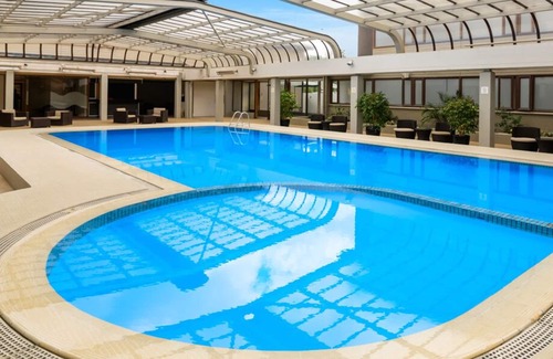 Rotorua Casa | Casa central de 3 dormitorios, piscinas de hidromasaje WIFI ++ gratuitas, piscina y gimnasio