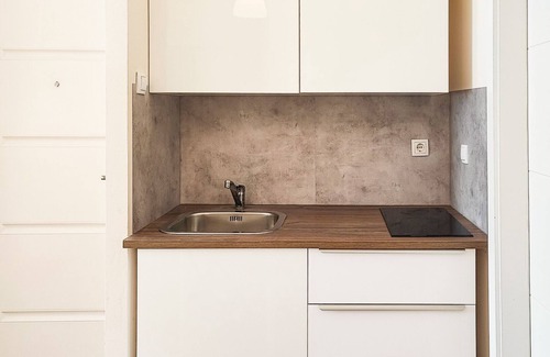 Novi Sad Apartamento | Estudio moderno y central en 5 minutos a pie de Trg Slobode