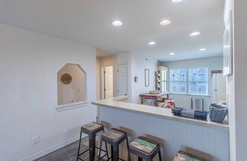 Bermuda Bay Casa | Centrally located townhome w/ a resort-style community pool & gorgeous sunsets!