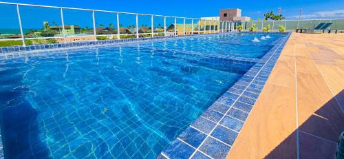 Porto de Galinhas Apartamento | CG101- Flat Rooftop com piscina infinita e garagem- By Oasis Ferias